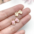 Pink enamel bow charms and gold textured metal pendants for DIY jewelry making - Pink Bowknot