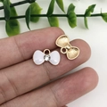 Miniature gold alloy bow pendant with white enamel and sparkling center diamond - White Bowtie with Rhinestone