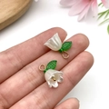 Pearlescent white acrylic lily of the valley flower charms with green leaves and gold rings - White Lily Of The Valley (22369)