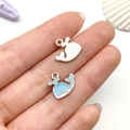 Light blue whale pendant jewelry charm with silver metal backing and hanging loop - Lake Blue Ocean Whale Style (21904)