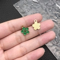 Green enamel flower charm pendant in gold finish with striped metal backing and hanging loop - Green Enamel Small Cherry Blossom (12085)