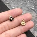 DIY flower charm pendants with gold base, black enamel, and faux pearl center for jewelry - Black Enamel Three-Petal Flower Charm (11915)