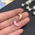 Macro shot of colorful enamel chili pepper charms showing front and back alloy textures - Pink (23378)