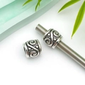 Perline cilindriche in argento antico con spirali e punti a rilievo per gioielli fai da te - Distanziatore a Onde Argento Antico (10097)