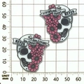 Detail view of acrylic skull and flower charms with measurements on a white grid scale - Pink White Acrylic Half Face Flower Skull (19314)