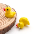 Mini yellow resin duck charms for DIY jewelry with silver metal hooks for kids - Yellow (17217)