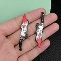 Acrylic knife pendant with black comic portrait and red blood splatters for Halloween - Black Acrylic Crying Girl With Blood Knife (19273)