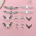 Antique silver bat pendants set for DIY jewelry making on a pink background - Antique Silver Bat Necklace Accessory Collection (SN664)