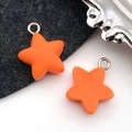 DIY orange star charms with matte resin finish and metal rings for jewelry making - Orange