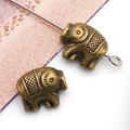 Macro view of vintage bronze elephant alloy beads for DIY jewelry and beaded crafts - Antique Bronze Elephant Spacer Bead (10135)