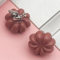 Detail view of matte pink pumpkin charms with silver metal stems for DIY jewelry making - Brown 3D Pumpkin (15495)