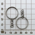 Close-up of a 28mm metal key ring with a short 3-link chain on a millimeter measurement grid - White K 25mm Ring With Chain (13068)
