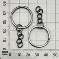 Top view of gun-black metal keychain rings with a 4-link chain measured on a scale - Gun Black 25mm Ring With Chain (13507)