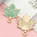 Mint green enamel maple leaf charm with gold metal plating for DIY jewelry making - Green
