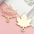 Pink marbled maple leaf charm with gold metal backing for DIY jewelry making - Pink