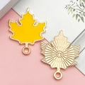 Golden alloy maple leaf pendant with bright yellow enamel for DIY jewelry making - Ginger Yellow