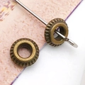 Perles d'espacement en bronze antique en forme d'engrenage pour création de bracelets DIY - Perle engrenage bronze antique (10156)
