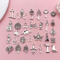 Set of 28 vintage silver alloy charms with heart, music note, and Eiffel Tower shapes - Antique Silver Style (SN705)
