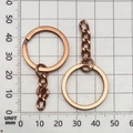 Rose gold plated metal keychain ring with four-link chain accessory on grid scale - Rose Gold 25mm Ring With Chain (13510)