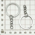 Silver metal key ring with short link chain connector on measurement scale board - White K Four-Section Chain (18768)