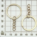 Golden plated metal split key ring with short chain link on millimeter grid board - KC Gold Four-Section Chain (18770)