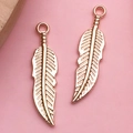 Rose gold feather charms for DIY necklaces featuring intricate metal textures - Leaf Pendant Style (11586)