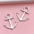 Set of two antique silver anchor charms for DIY jewelry making on pink background - Small Ship Anchor (11318)