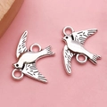 Pendentifs oiseaux en alliage argenté pour bijoux DIY sur fond rose - Hirondelle (3079)