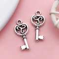 Antique silver key-shaped alloy pendant charms with spiral patterns for DIY jewelry - Key (17327)
