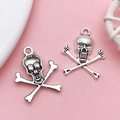 Set of two silver skull and crossbones alloy charms for DIY jewelry making - Halloween Skull Head (17336)