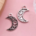 Pair of antique silver moon shaped alloy pendants with intricate hollow patterns for DIY - Antique Silver Hollow Moon (8764)