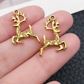 Antique gold reindeer alloy pendant charm with intricate swirl patterns for DIY jewelry - Christmas Reindeer (10229)