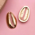 Golden alloy seashell pendants for DIY jewelry making on soft pink background - Ocean Shell Accessory (11632)