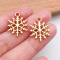 Par de colgantes de copos de nieve dorados para creación de joyas DIY y pulseras - Copo de Nieve de Navidad (15482)