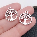 Detailed view of hollow Tree of Life pendants in silver alloy for DIY jewelry crafting - Ancient Silver Round Tree of Life (11270)