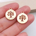 Macro shot of gold-plated tree of life charms with My Family and My Love engravings - KC Gold Round Tree Of Life (19917)