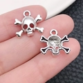 Zilveren schedel en gekruiste knekels bedeltje voor DIY sieraden maken - Schedelstijl (10888)