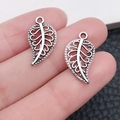 Silver hollow leaf charm pendants for DIY jewelry making with intricate filigree details - Antique Silver Leaf (3962)