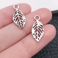 Silver hollow leaf charm for jewelry making with detailed leaf vein and top ring - Ancient Silver Leaf (10409)