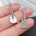 Detailed close-up of double-sided guitar charms for DIY necklaces and bracelets - Antique Silver Guitar Double-Sided (18936)