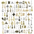 Assortiment de breloques instruments de musique, guitares et notes en finitions métal - Styles Musicaux Mixtes 5 Couleurs (SN898)
