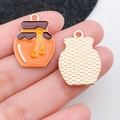 Front and back view of honey pot enamel charm with intricate grid texture and vibrant colors - Honey Pot (19338)