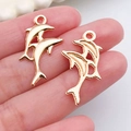 Pendentifs dauphin dorés en alliage pour création de bijoux DIY et accessoires - Pendentif Dauphin Sautant (18338)