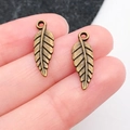 Antique bronze leaf charm pendants with detailed vein texture for jewelry making - Antique Leaf (19937)