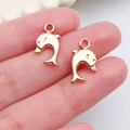 Pendentifs dauphins en métal plaqué or KC pour la création de bijoux et l'artisanat - Mini Pendentif Dauphin (20705)