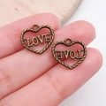 Detail of bronze heart charms with LOVE lettering and woven texture for DIY jewelry - Love Lettering Heart Charm (19939)