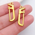Mini pendentifs scie en alliage doré pour bijoux DIY et porte-clés sur doigts - Scie Outil Or Antique (20396)