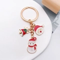 Christmas keychain with gold enamel Santa, snowman, and bell charms on a stone base - Snowman Bell Santa Head Style (ER820)