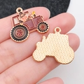 Enameled tractor alloy pendant for DIY jewelry, featuring a rustic reddish-brown finish - Pumpkin Man In Car (19324)