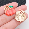 Orange enamel pumpkin charm with golden textured back for DIY jewelry and keychains - Pumpkin With Vine (19335)